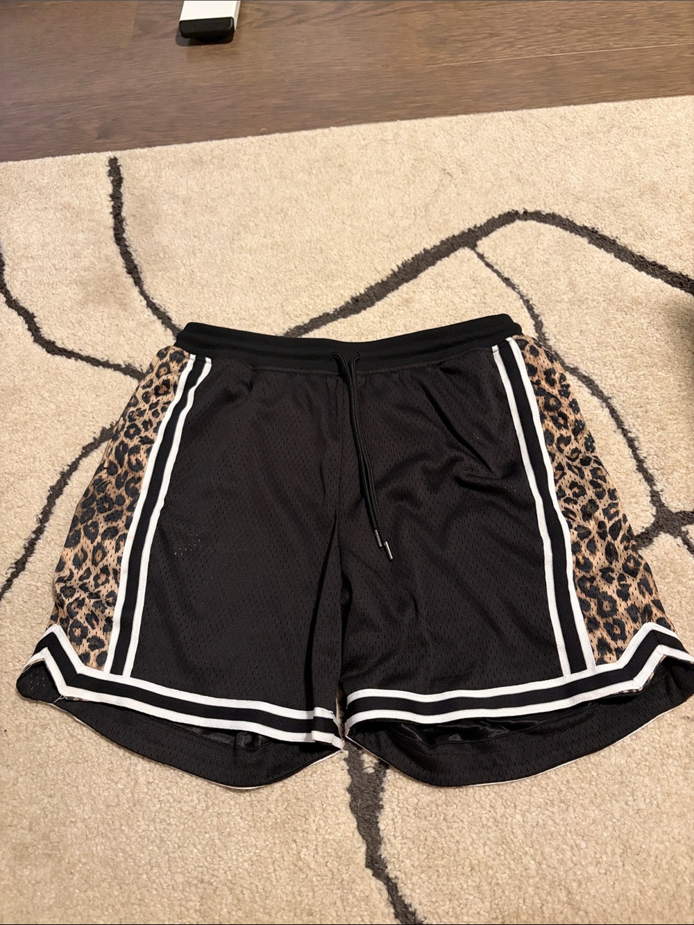 John Elliott Black Athletic Shorts with Leopard Side Panels and White Stripes